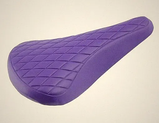 NEW! ABSOLUTE UNIVERSAL BMX BICYCLE VINYL SADDLE IN DIAMOND STYLE IN PURPLE.